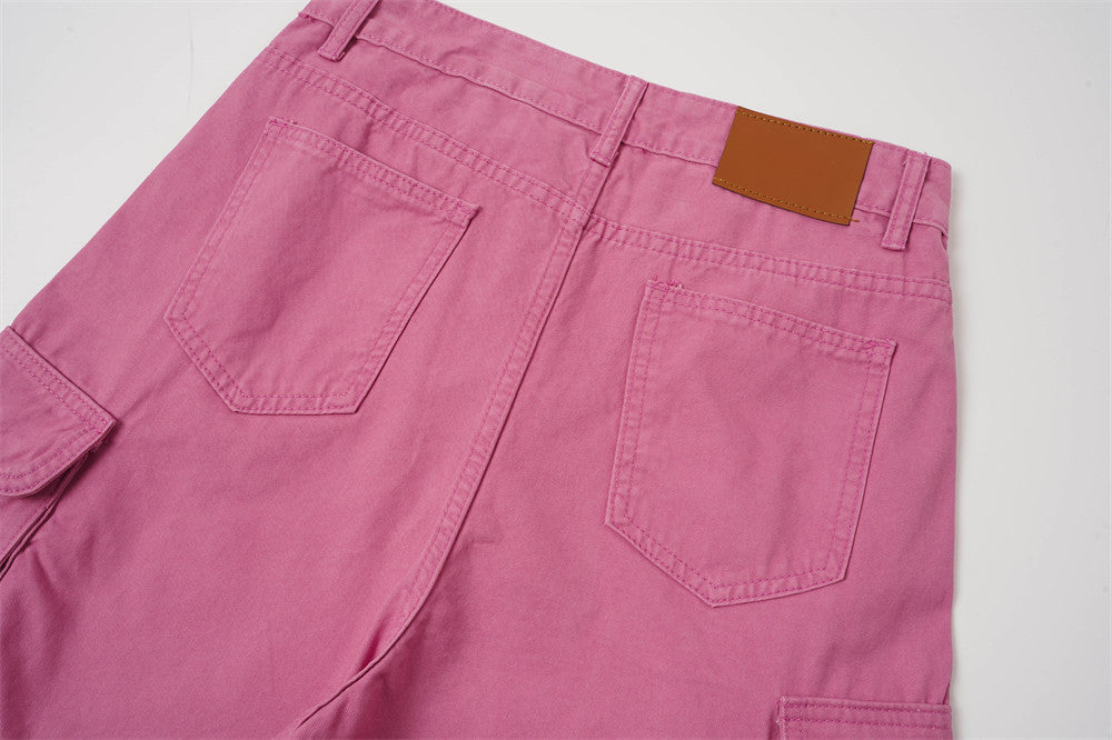 Back waistband view of rose pink cargo shorts with patch pockets and label