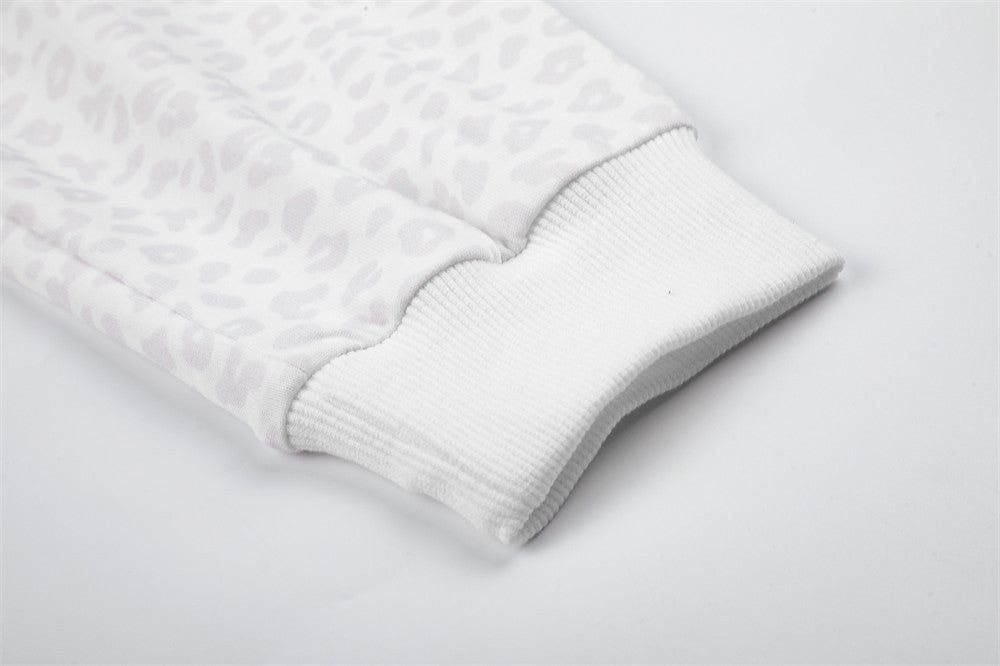 White Long Sleeve Polo Shirt with Leopard Texture, Stripe Collar & Ribbon Detail