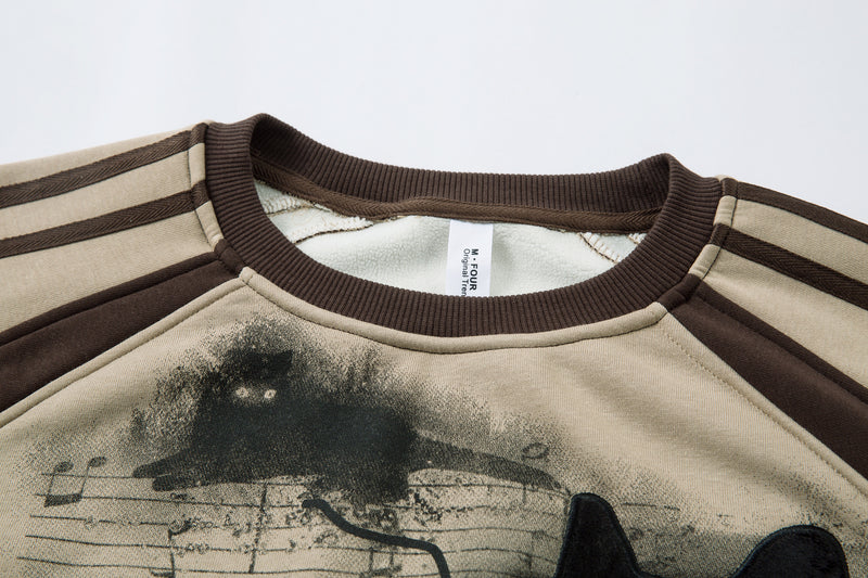 Sweat-shirt motif chat en smoking avec imprimé note de musique et manches raglan color block