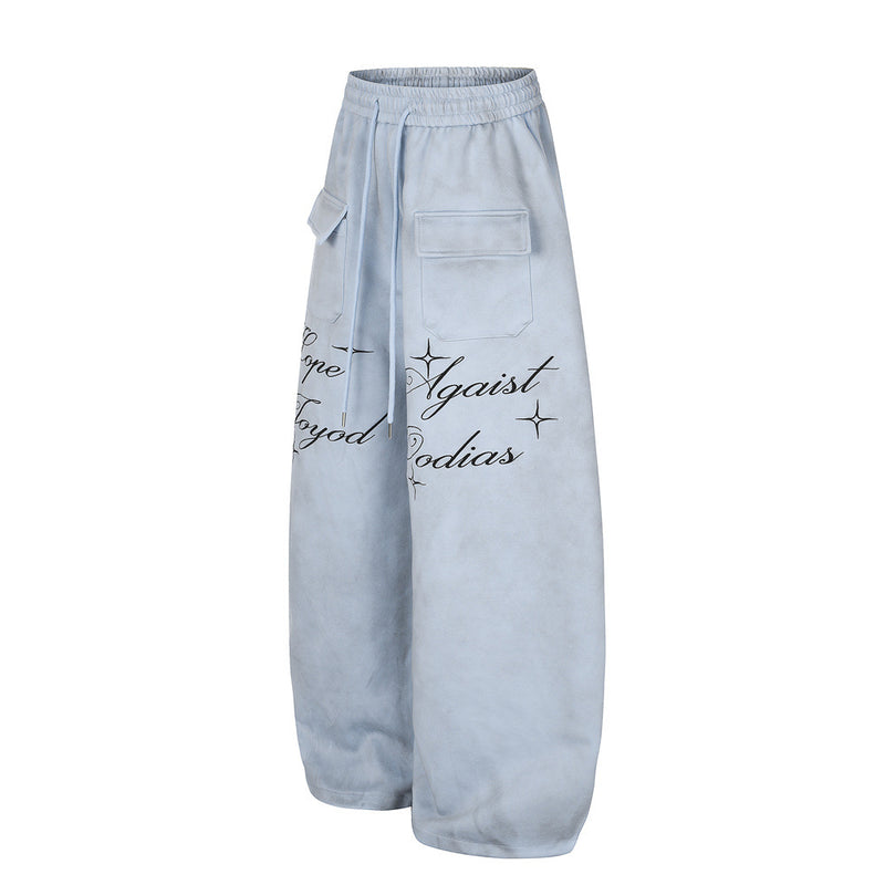 Pantalon de survêtement en velours côtelé à jambes larges avec imprimé script et poches cargo