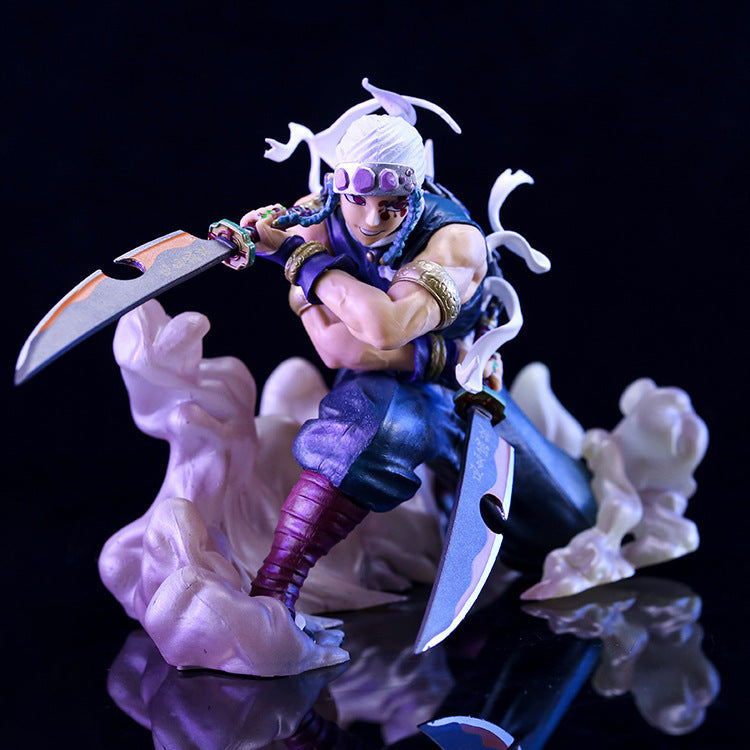 The Uzui Tengen Action Figure by Demon Slayer features a dynamic pose with dual blades and a crouching stance. It showcases white hair, purple goggles, and muscular arms on a cloud-like base against a black backdrop, highlighting the Sound Hashira&