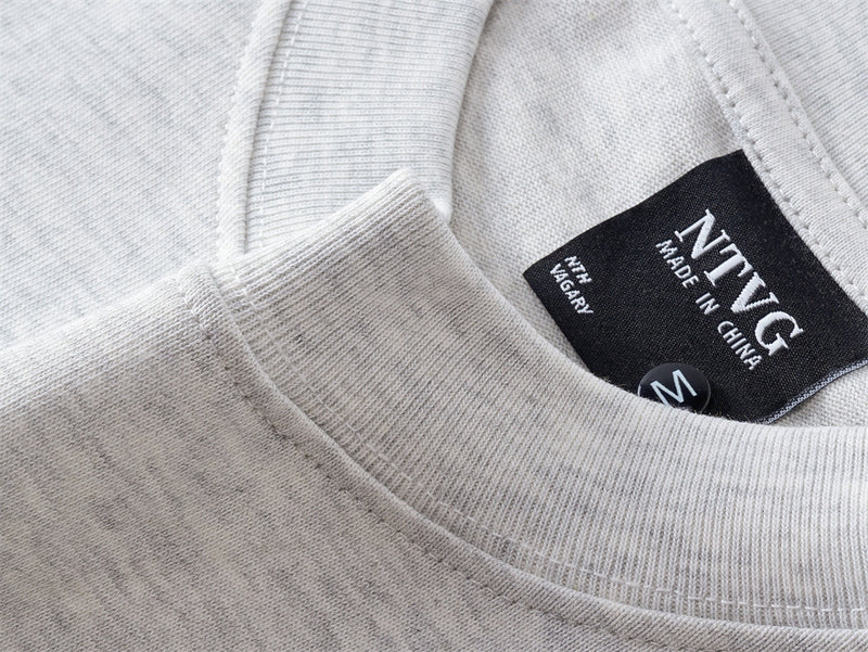 Langarm-T-Shirt mit Rundhalsausschnitt – minimalistischer Schriftprint, meliertes Grau