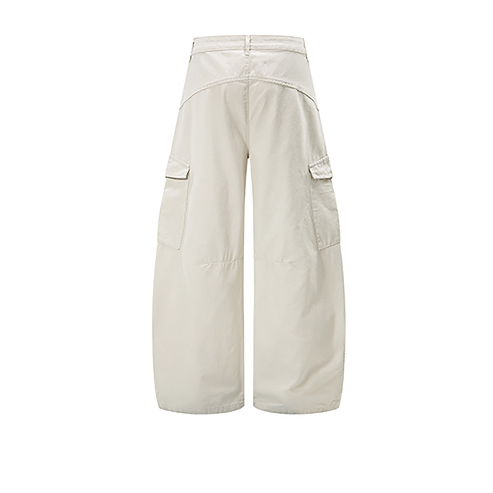 Cream wide-leg cargo pants with flap side pockets, back view