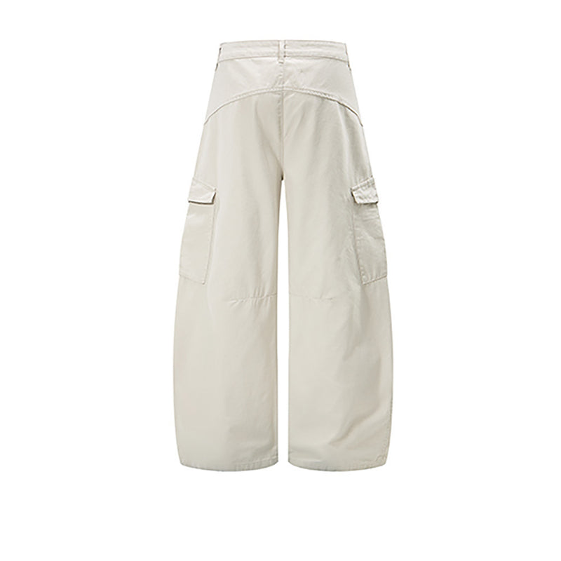 Cream wide-leg cargo pants with flap side pockets, back view