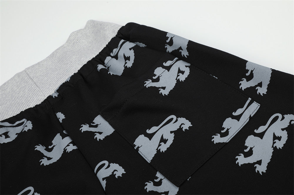 Pantalon de survêtement large imprimé lions, avec bande contrastante taille haute