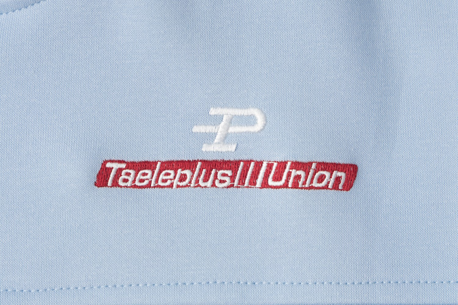 Sweat à capuche bleu zippé intégral avec patch brodé du numéro varsity 07