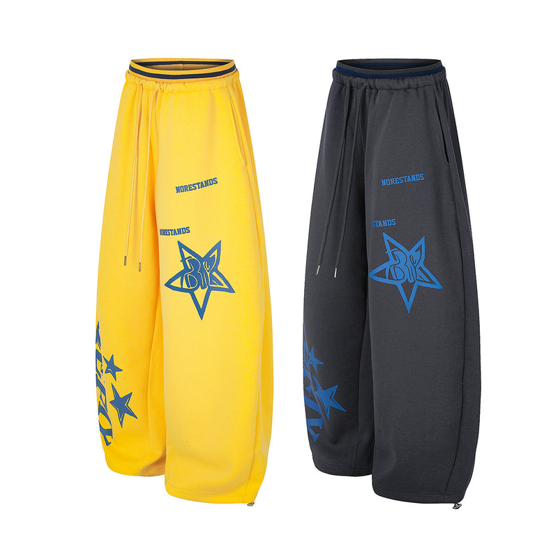 Pantalon de survêtement graphique à jambes larges, imprimé étoile et taille à cordon