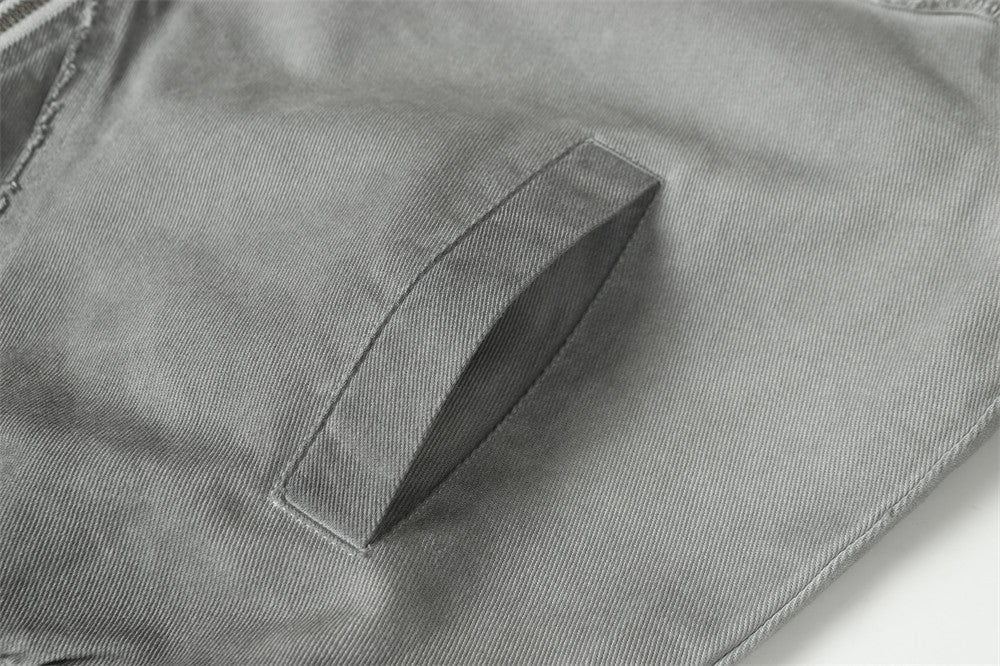 Blouson bomber déconstruit en patchwork – Toile délavée et coutures brutes