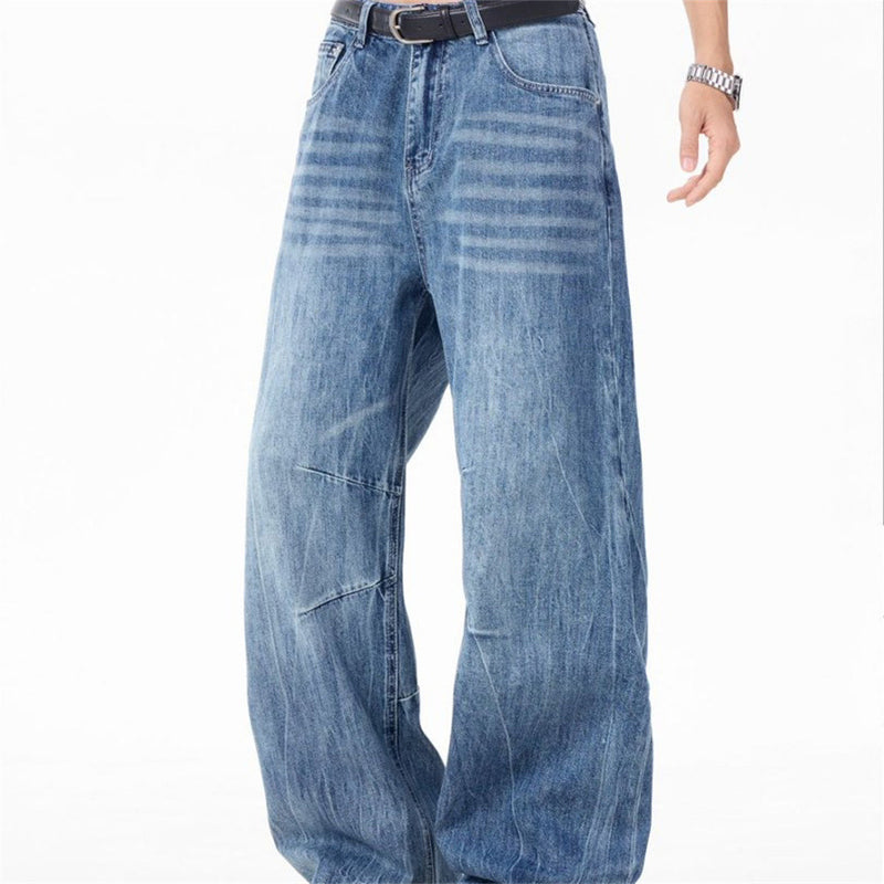 Wide-Leg Baggy Jeans – Washed Blue Curved Seam Design with Contrast Pocket