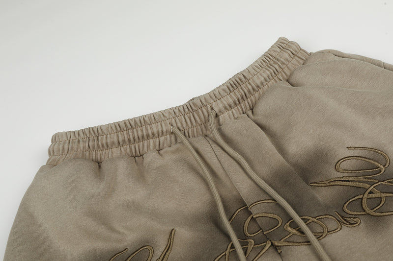 Pantalón Cargo Caqui de Chándal Baggy de Pierna Ancha con Bolsillos de Remaches y Texto Bordado
