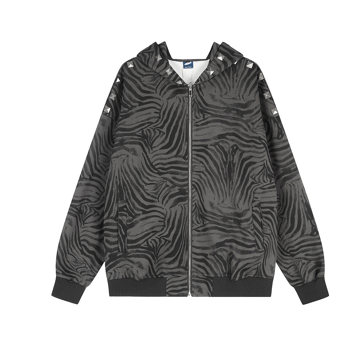 Dark grey all-over zebra stripe print zip-up hoodie jacket with silver pyramid rivet studs along the shoulder seam, front and