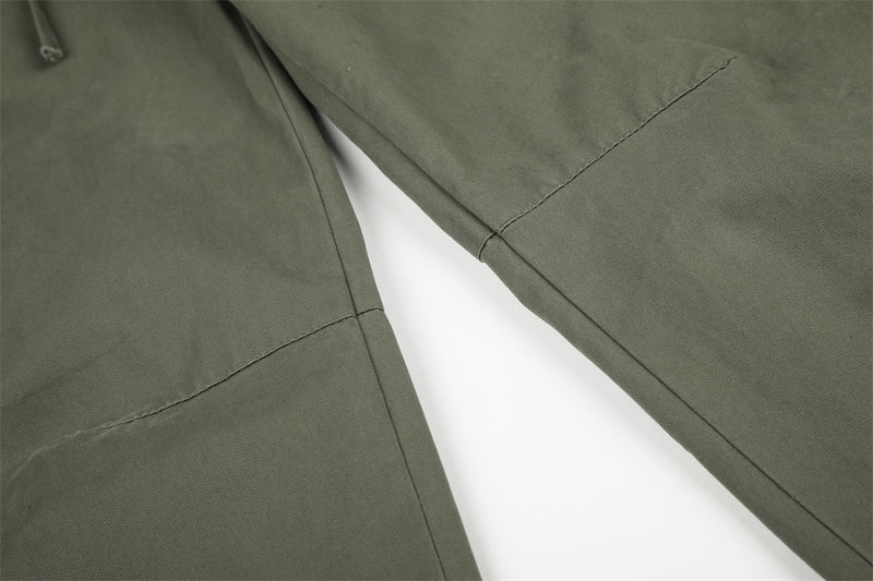 Pantalon palazzo à jambes larges – Taille haute, braguette à boutons, ceinture côtelée et ourlet brut