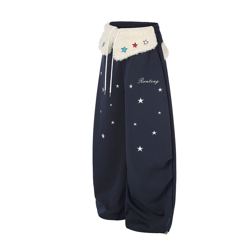 Pantalon de survêtement à jambes larges avec ceinture en sherpa et étoiles brodées
