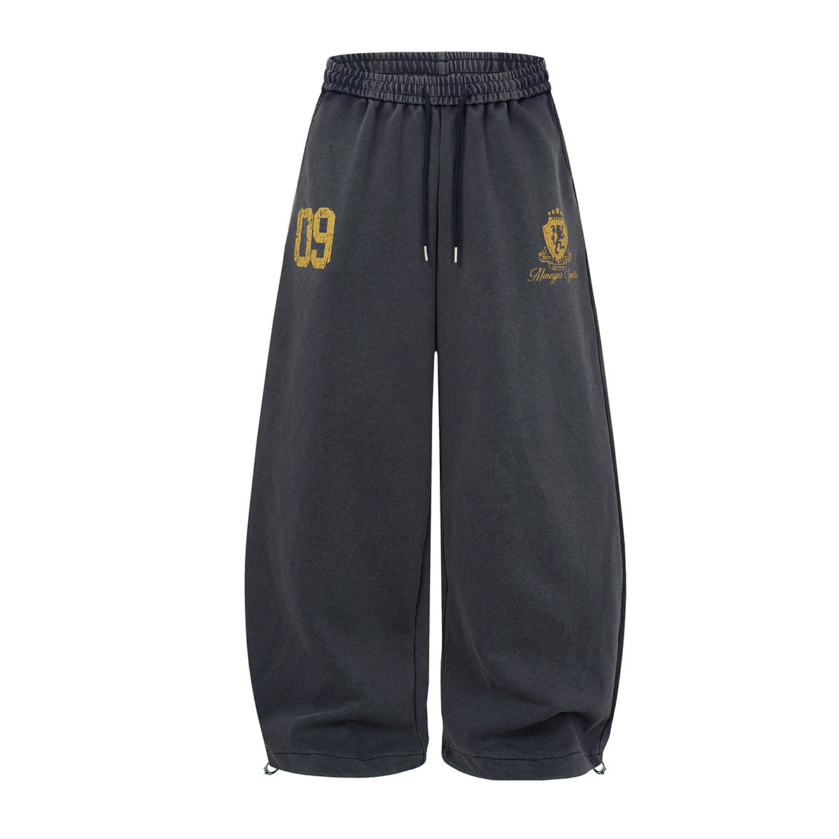 Oversized wide-leg acid-wash sweatpants with varsity 09 number print and heraldic crest graphic in charcoal black