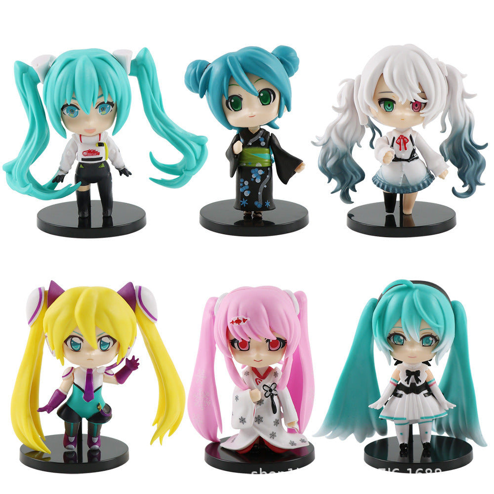 The 6-Piece Set Hatsune Miku Kimono Figures, each 9.4cm with removable heads, features distinctive chibi-style designs: top row includes teal-haired Hatsune Miku and a white-haired figure; bottom row presents yellow, pink, and more teal-haired characters in Japanese-inspired outfits.