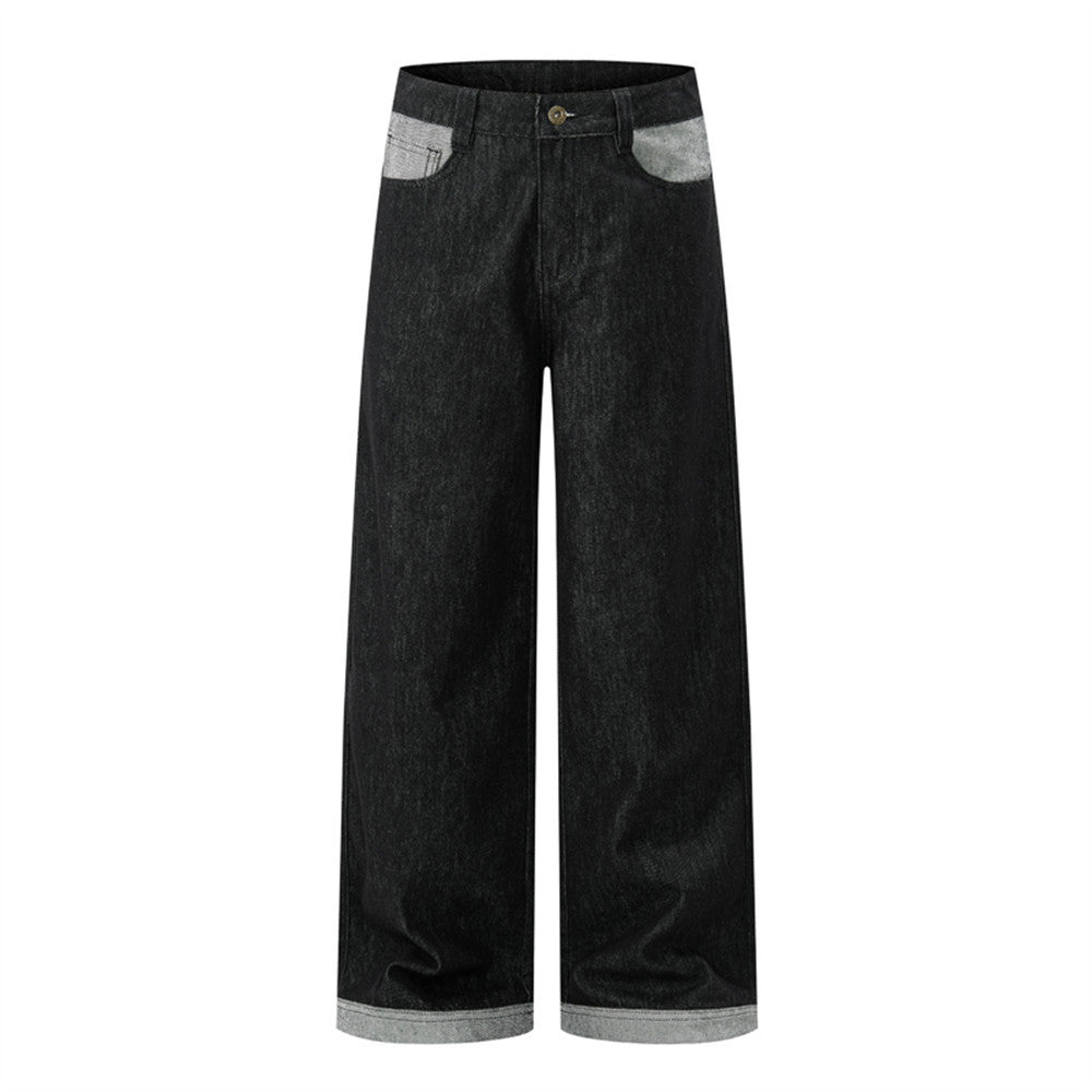 Jean homme baggy noir à jambes larges, poches grises contrastantes et ourlet retroussé, vues avant et arrière