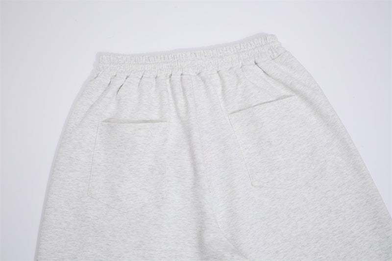 Pantalon de survêtement à jambes larges avec imprimé numéro universitaire et étoile