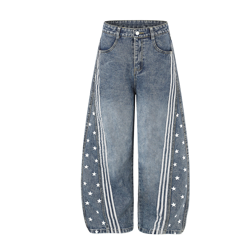 High waist baggy wide-leg jeans with white star print panels and triple stripe detail in washed blue denim