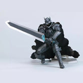 This 16 cm PVC action figure presents Guts in his Berserker Armor with a large sword and dramatic pose. The striking dark, angular armor and helmet, alongside the flowing black cape, make this fully poseable piece a must-have for any Berserk fan&