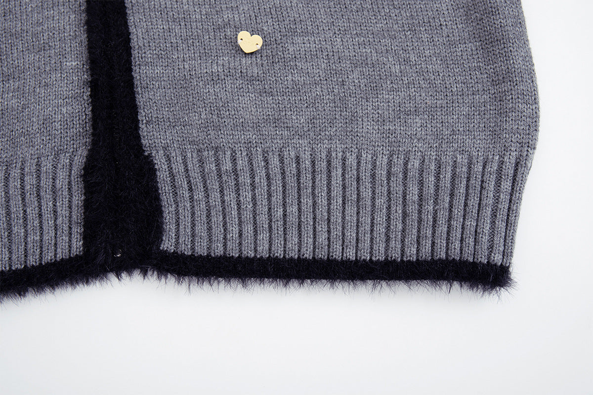 Gilet en maille zippé avec ornements cœur et étoile