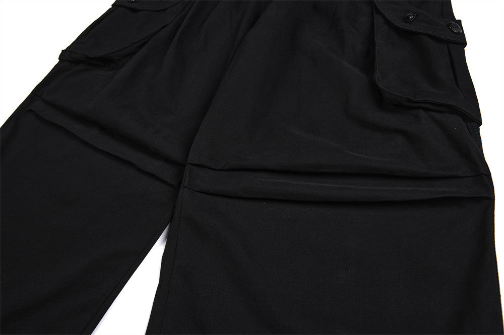 Pantalon cargo homme noir wide leg avec taille effet double boutonnage et multiples poches