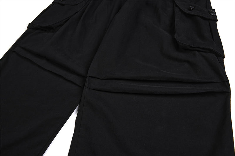 Pantalon cargo homme noir wide leg avec taille effet double boutonnage et multiples poches