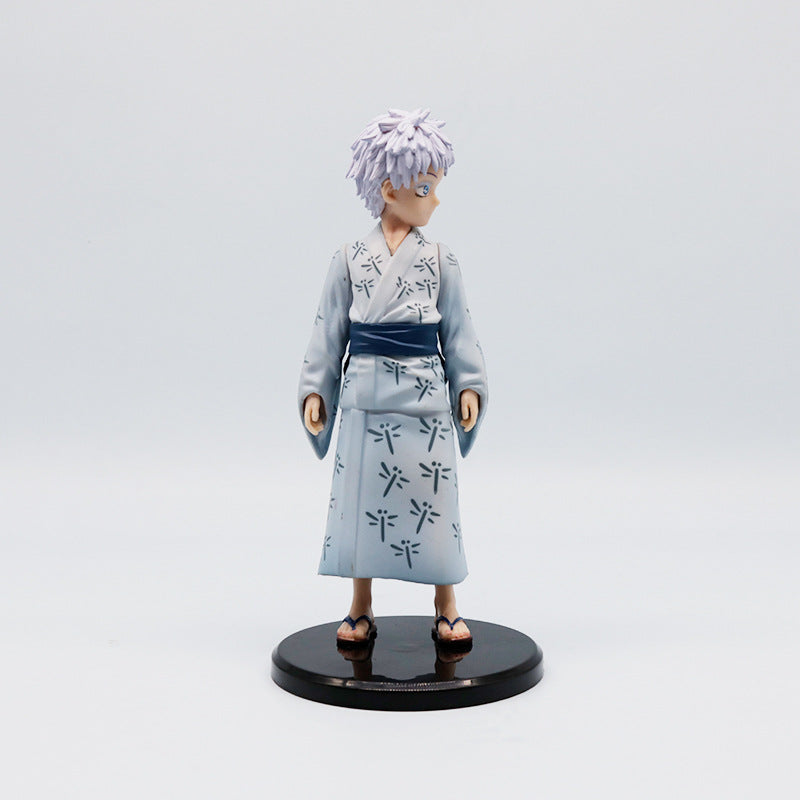 The Jujutsu Kaisen Satoru Gojo PVC Figure is an 18 cm collectible statue featuring Gojo in a traditional yukata with spiky white hair. Standing on a black circular base, it captures his iconic side glance.