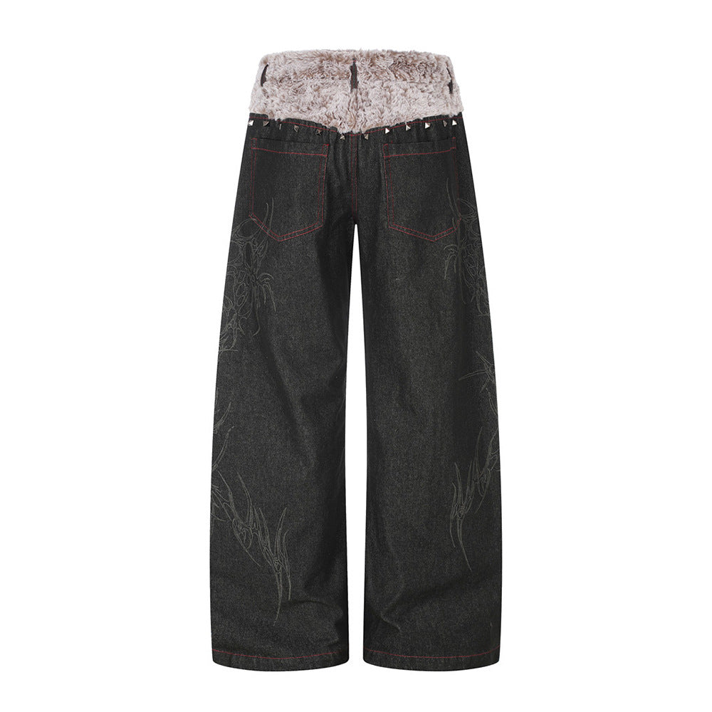 Schwarze Wide-Leg-Jeans mit Kunstfell-Kontrastbund und Nieten-Details