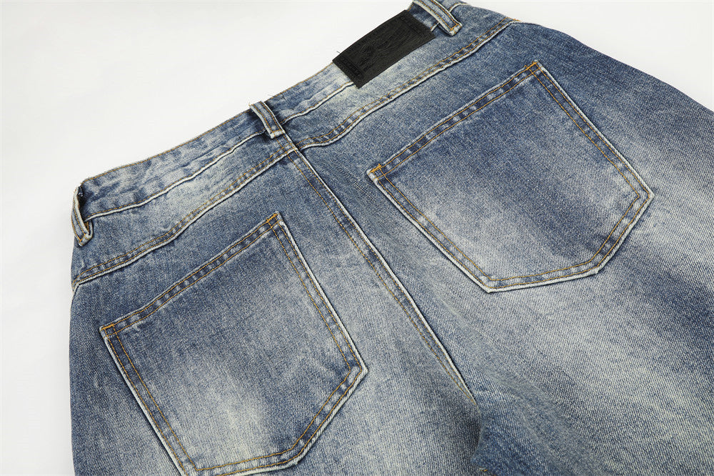 Wide-Leg Straight Jeans – Herrenjeans aus verwaschenem blauem Vintage-Denim mit Destroyed-Details