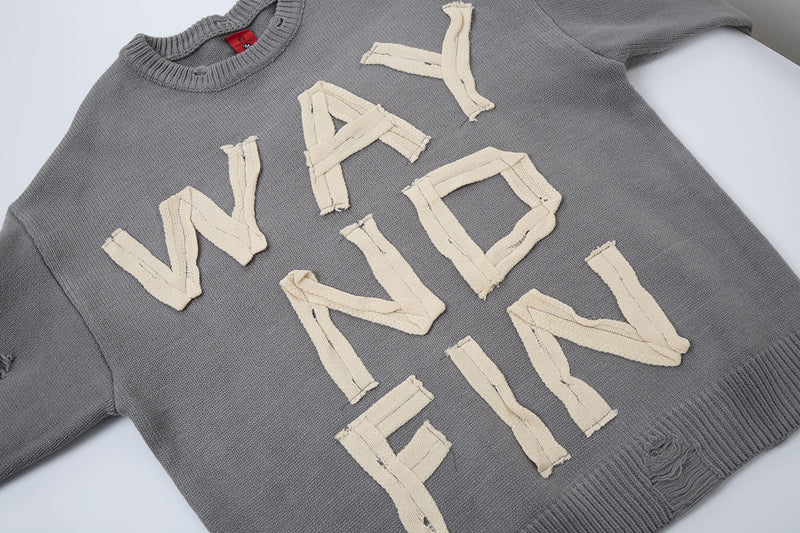 Pull col rond oversize en maille usée avec motif de lettres appliquées