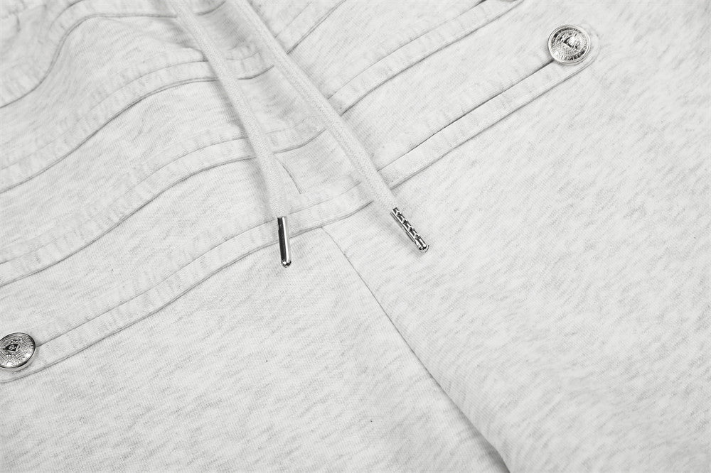Jogging homme coupe large avec détails de boutons croisés et taille élastique