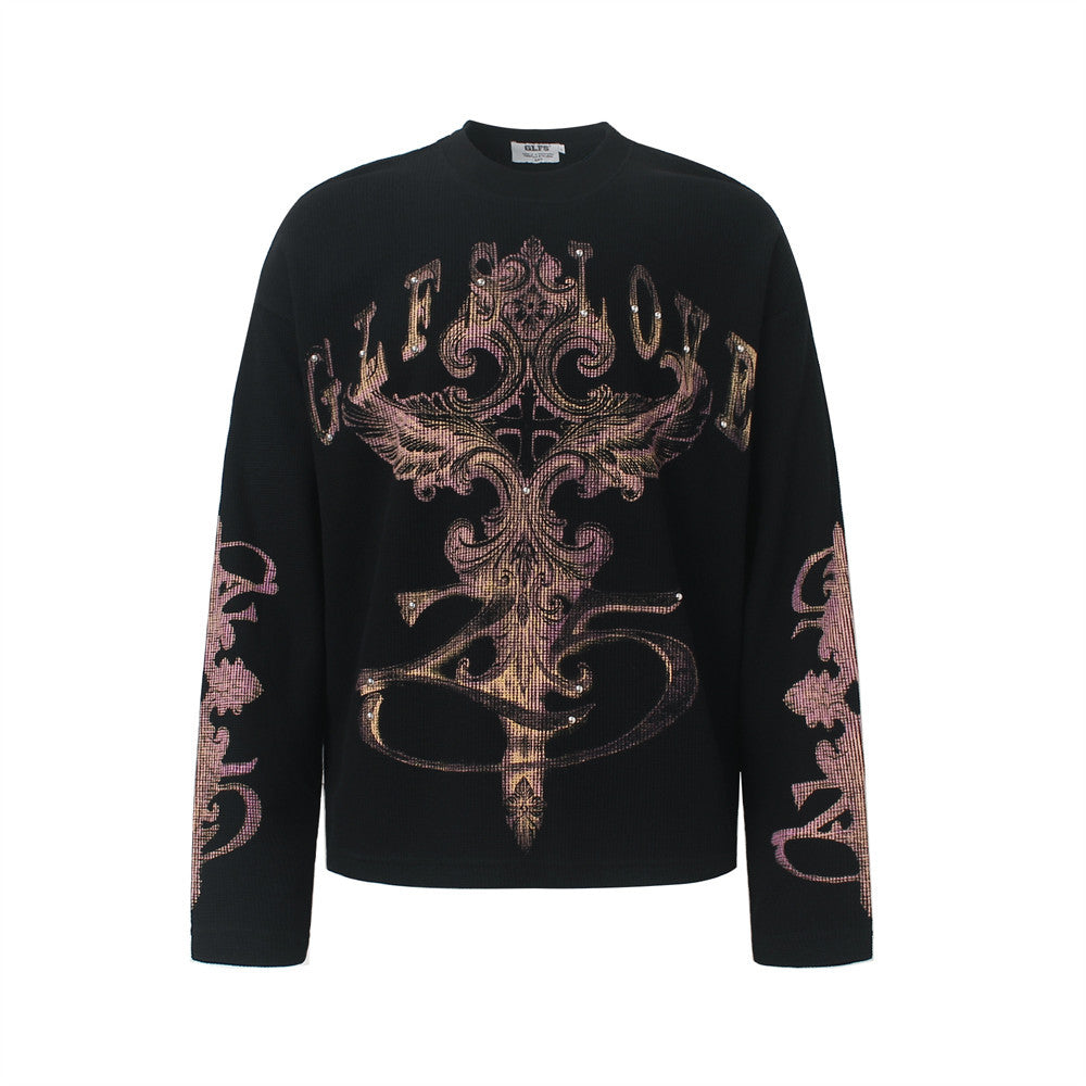 Black oversized waffle-knit long sleeve shirt with dark cross flame baroque graphic print and gothic lettering on sleeves