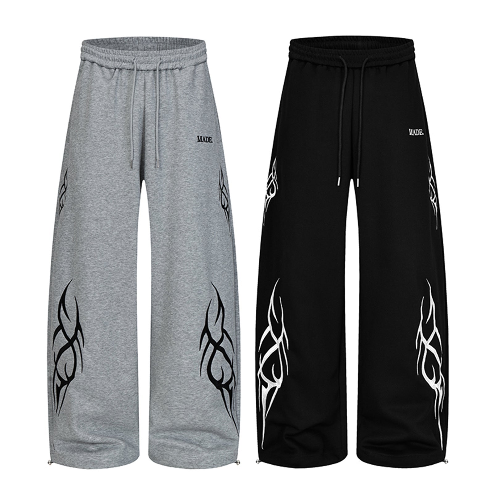 Wide-leg sweatpants with tribal flame print on both legs, drawstring waist, shown in black and heather grey
