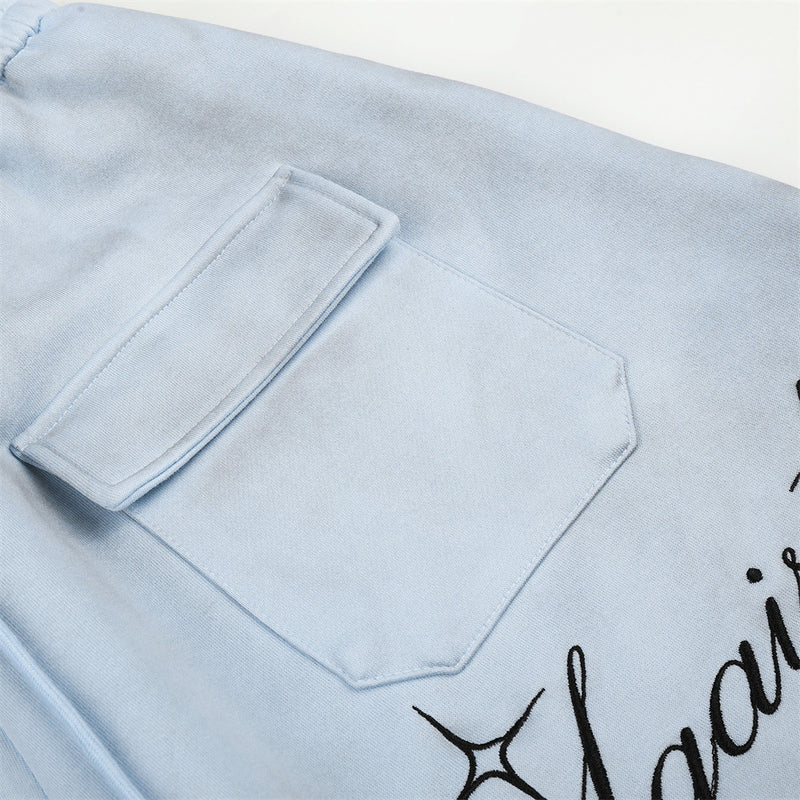 Pantalon de survêtement en velours côtelé à jambes larges avec imprimé script et poches cargo