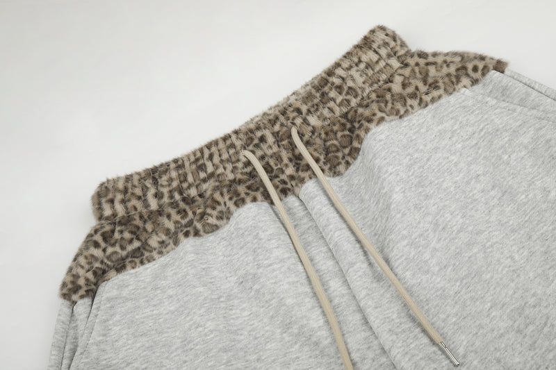 Baggy-Sweatpants mit Leopardenbund und Stern-Applikation