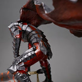 The Berserk Guts Bloodstained Warrior 1/7 Scale PVC Figure by Berserk portrays dynamic motion with detailed red and metallic gray armor, a cloak, and a sword, standing at 18 cm.