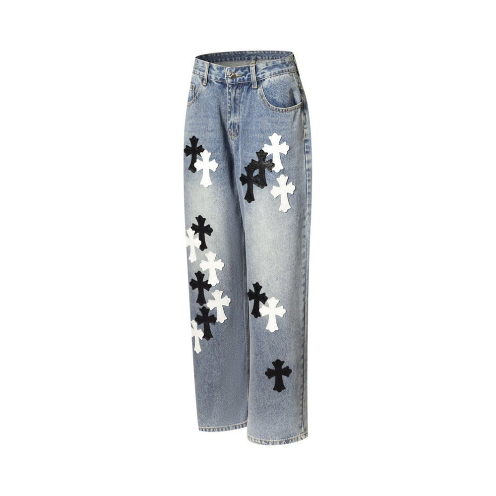 Light wash wide-leg jeans with cross patches, side view