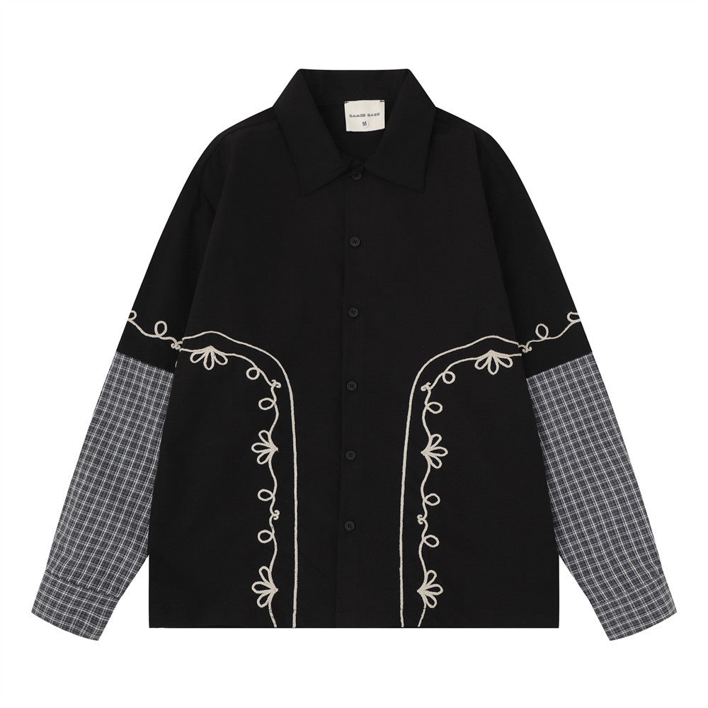 Oversized embroidered patchwork long sleeve shirt with grey plaid contrast sleeves and floral vine embroidery on chest, shown