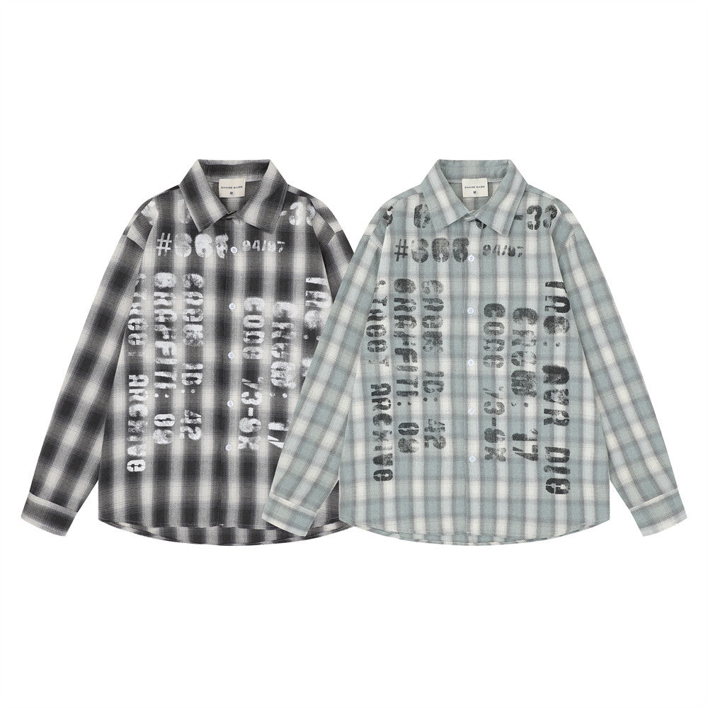 Two oversized plaid flannel shirts with distressed letter print, one black and one light gray