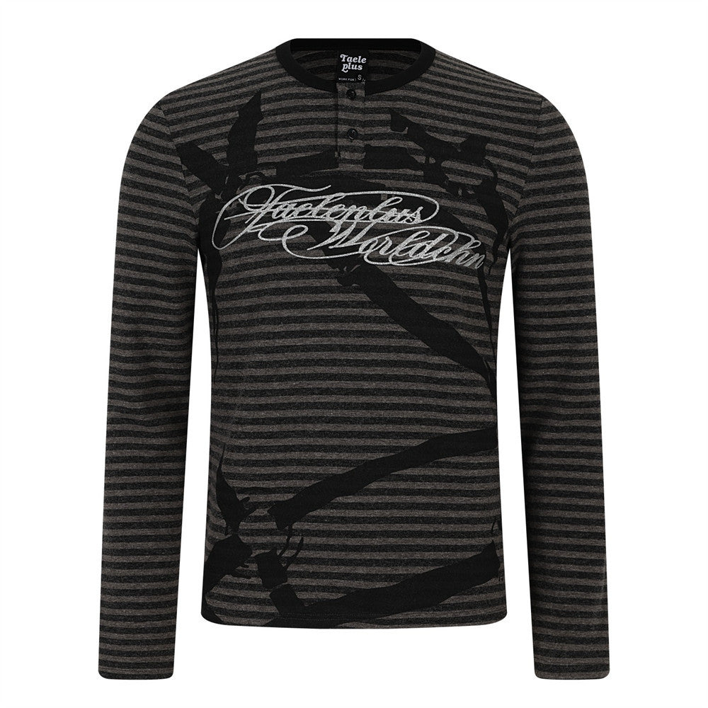Men's black and charcoal striped Henley long-sleeve tee with oversized vintage script graphic print on chest