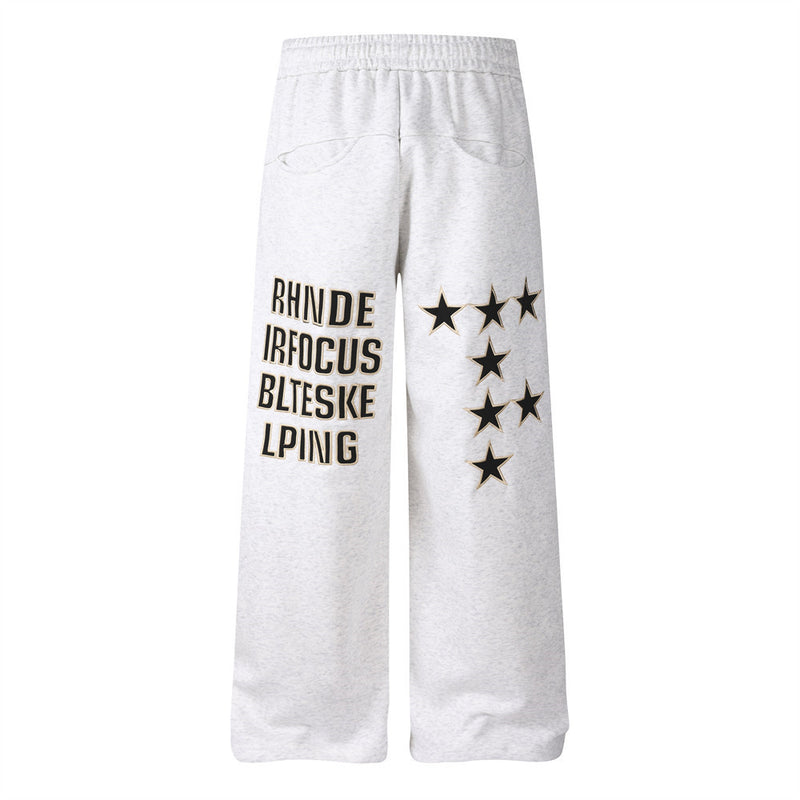 Pantalon de survêtement homme coupe wide leg – Étoiles, lettrage et cordon plissé
