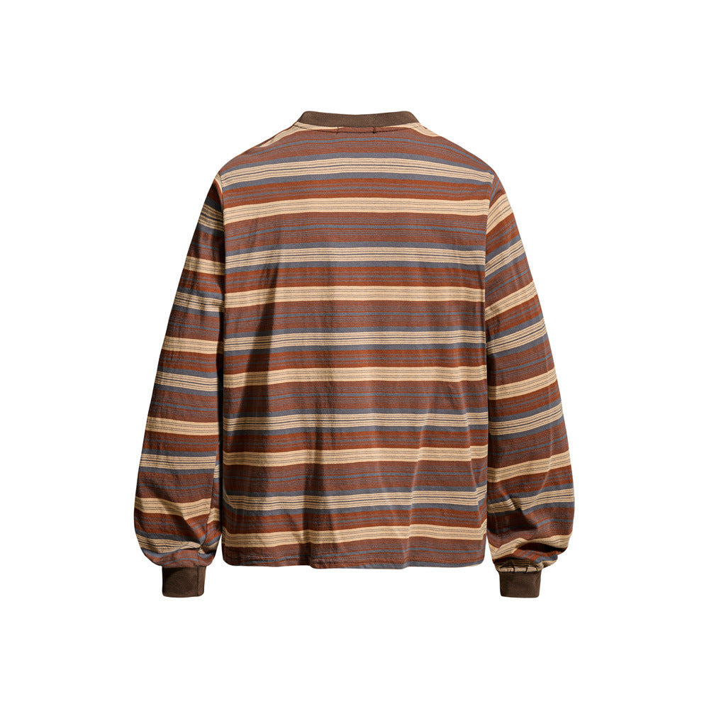 Back view of long sleeve striped crewneck shirt with ribbed collar and cuffs
