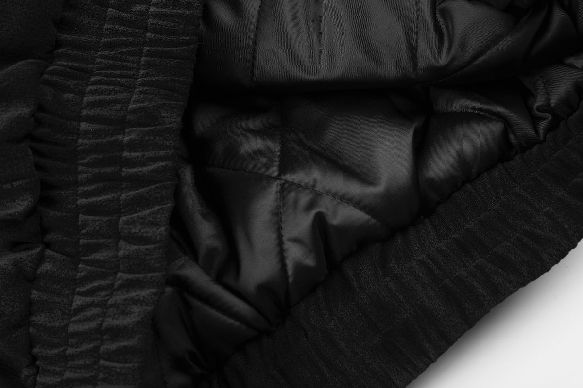 Schwarze Bomberjacke mit Wildlederoptik, Kunstpelzkragen und Wattierung im Biker-Stil