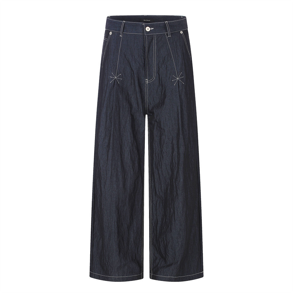 Dark navy wide-leg denim pants with white contrast topstitching and star-burst tack stitch pocket details, front and back vie