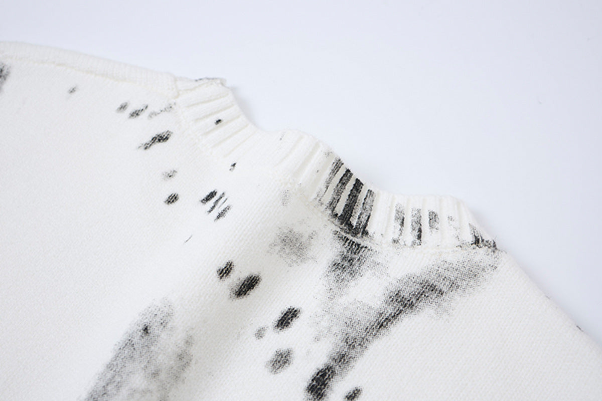 Pull en maille col rond éclaboussures d’encre – Motif peinture déstructuré