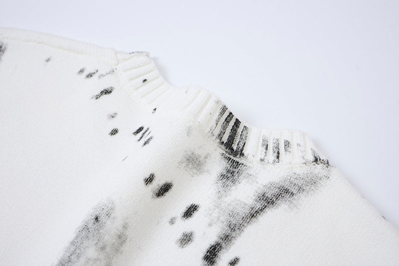 Pull en maille col rond éclaboussures d’encre – Motif peinture déstructuré