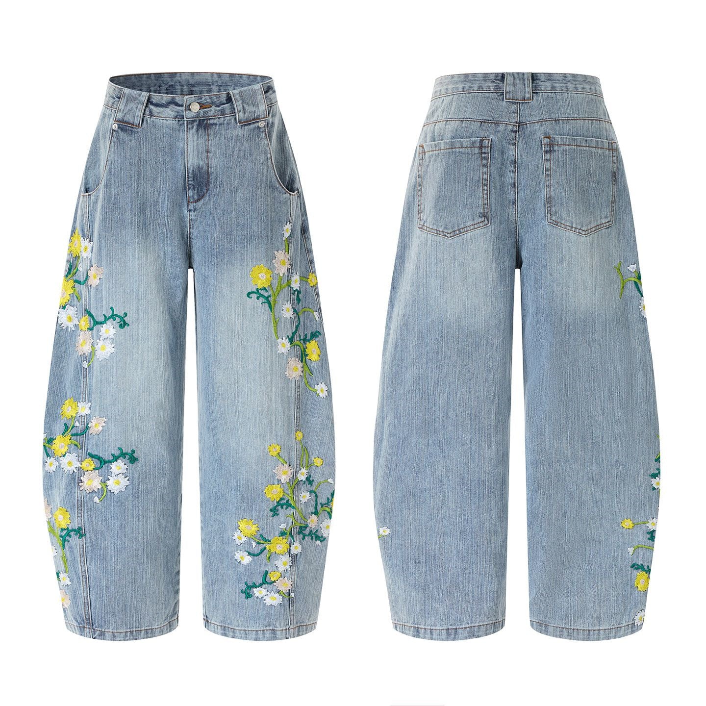 Men's light blue washed wide-leg barrel jeans with white daisy and yellow wildflower embroidery on green vine stems across bo