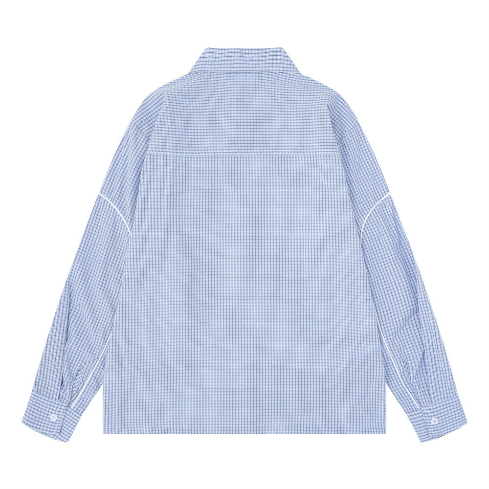 Light blue plaid long sleeve shirt shown from the back, oversized fit with contrast piping
