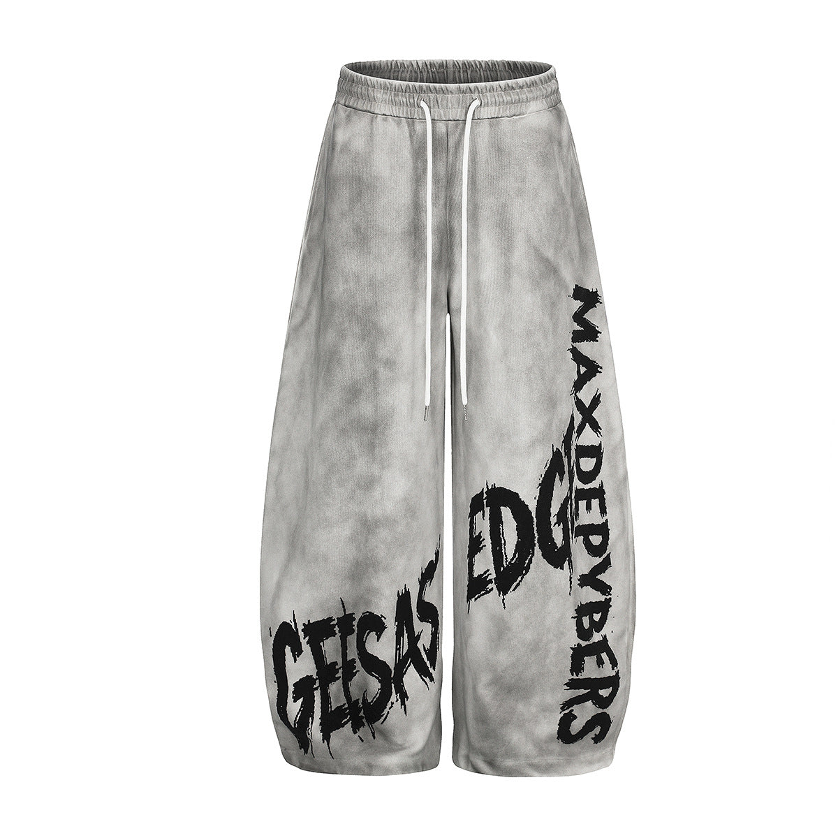 Oversized wide-leg acid-wash sweatpants with bold graffiti text print on both legs in light grey