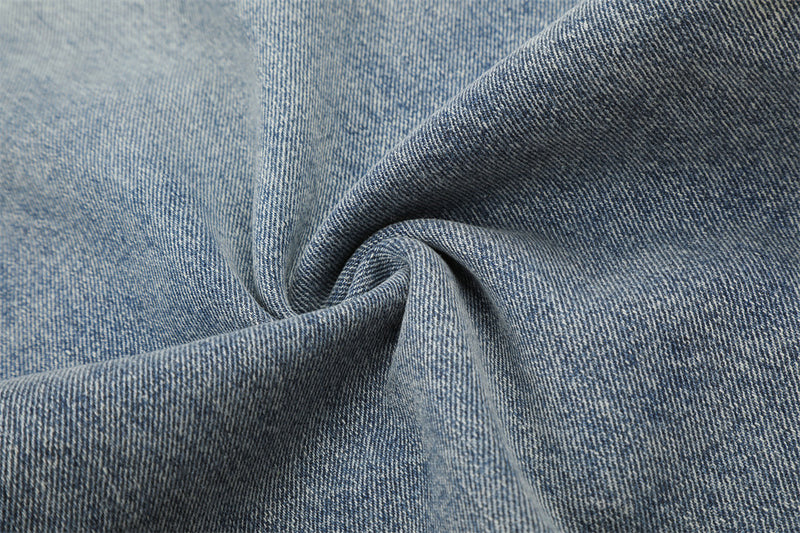 Jean large déchiré pour homme avec ornements en strass et étoiles
